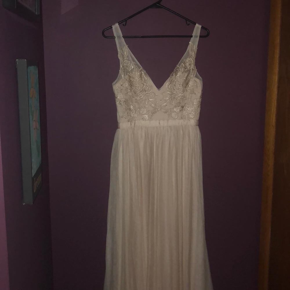 Gorgeous cream floor length dress.